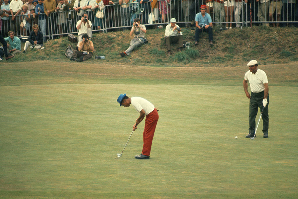 Lu Liang-Huan is watched by Roberto De Vicenzo at Royal Birkdale in 1971